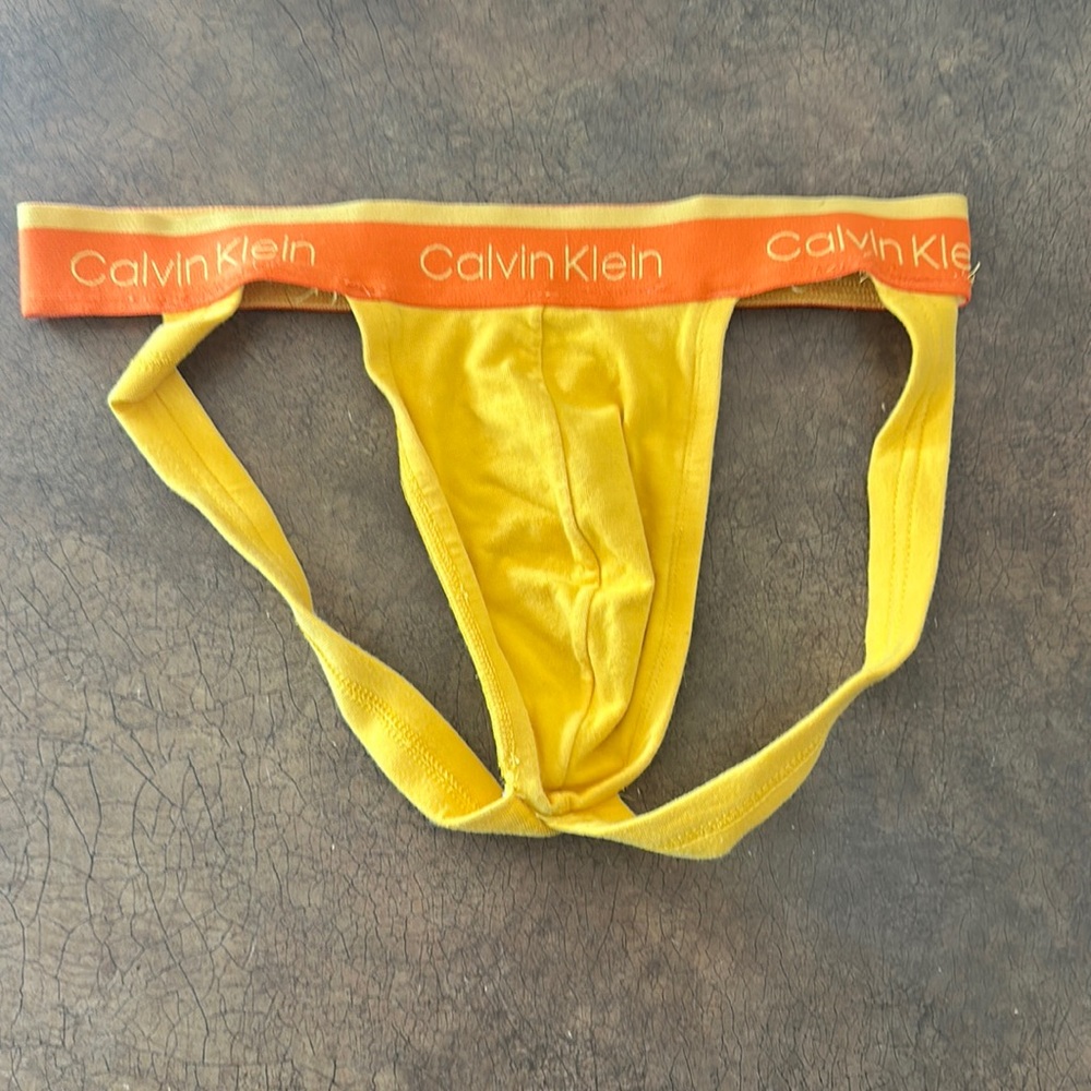Men’s yellow Calvin Klein Jock, size small